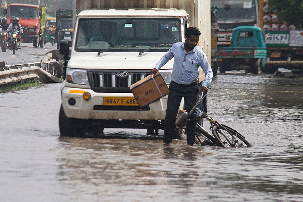 | Photo: PTI : Weather: Rains in Gurugram